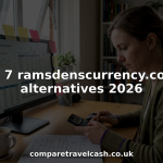 Person comparing travel money rates in home office