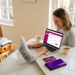 Traveler loading prepaid card at kitchen table